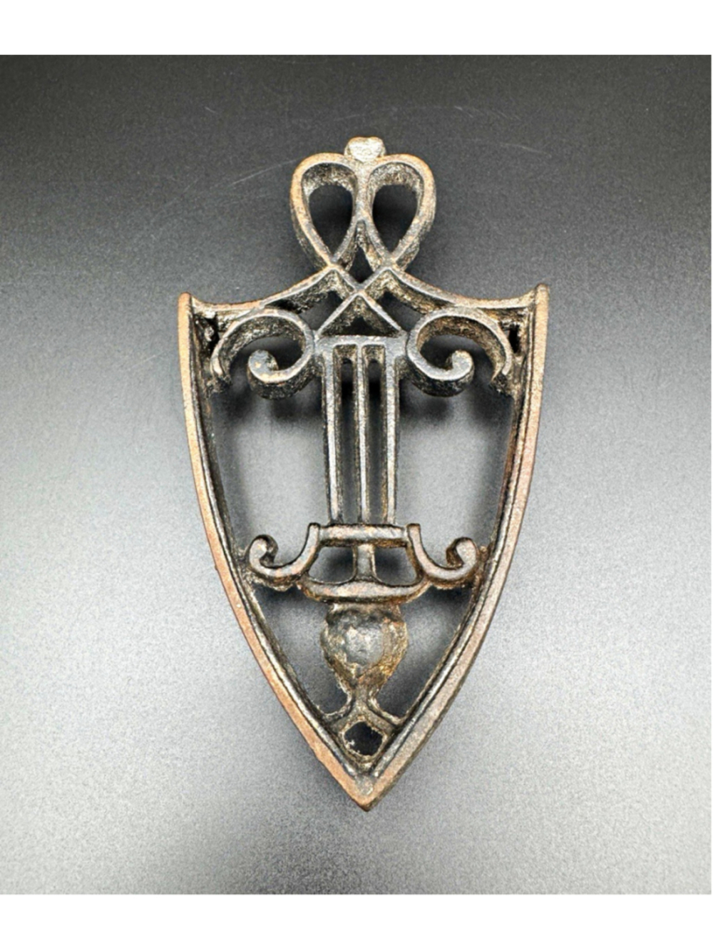Cast Iron Shield Shape Trivet Black Openwork Design 7 in H x 5 in W